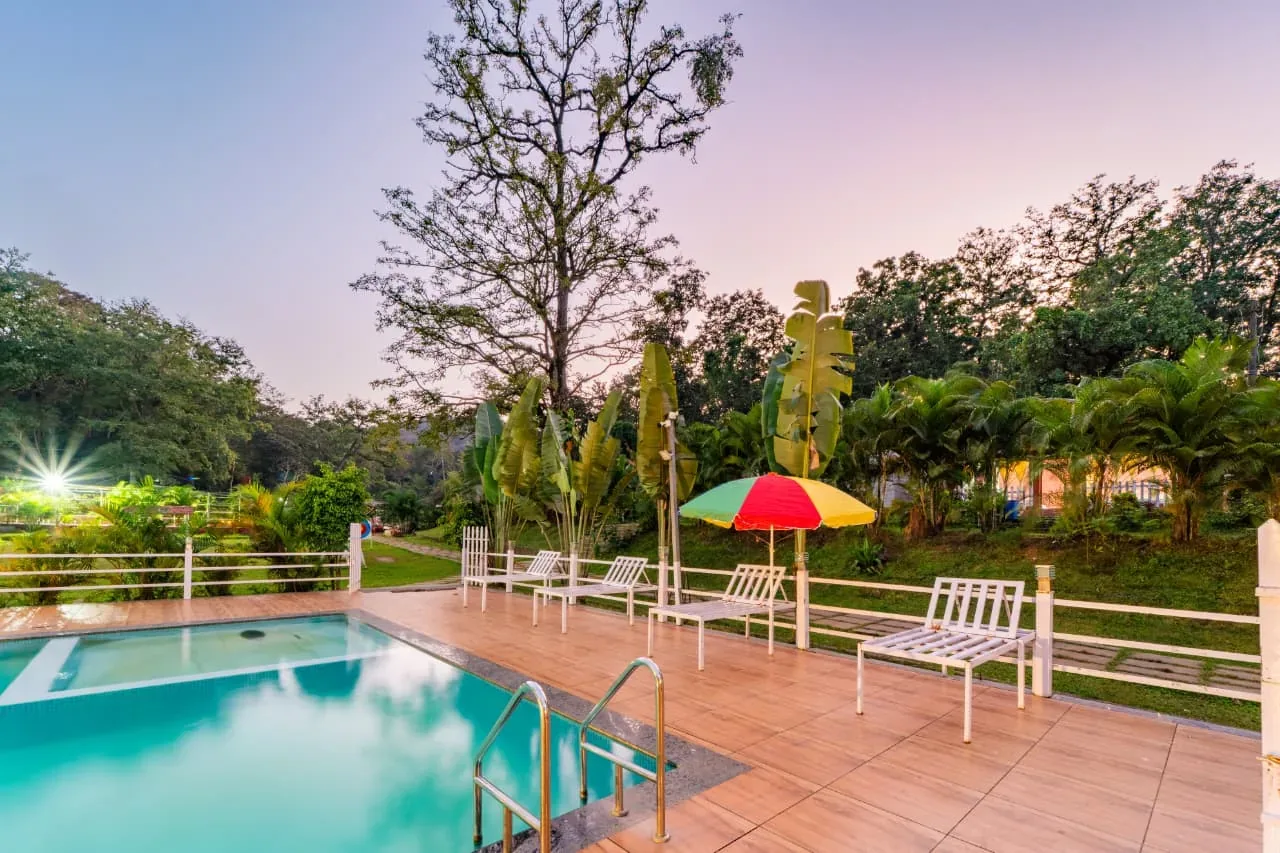 Open green family-friendly area at a Dandeli stay