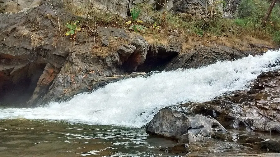 Water flowing through the rocky landscape at Syntheri Rocks near Dandeli